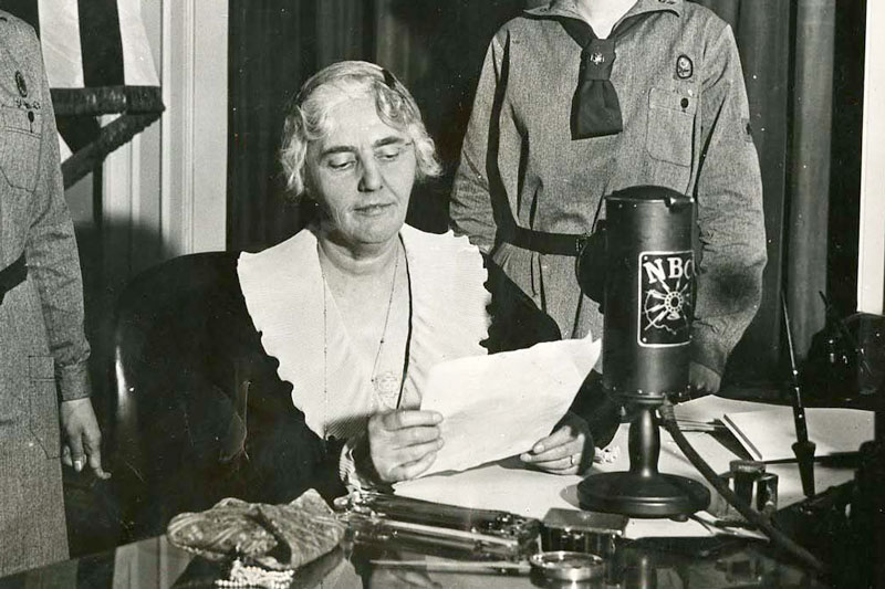 Lou Henry hoover speaking from the President's study in the White House on a special Girl Scout program. 03/24/1931. 31-1931-35